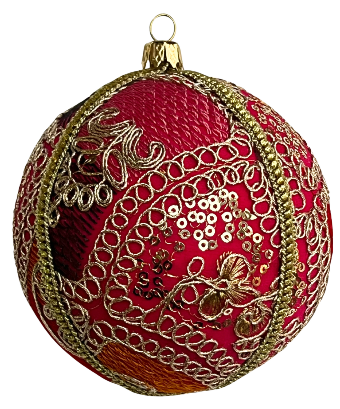 A single 10cm Aarna Bauble with vivid red fabric and intricate gold thread and sequin detailing, displayed on a clean white background.