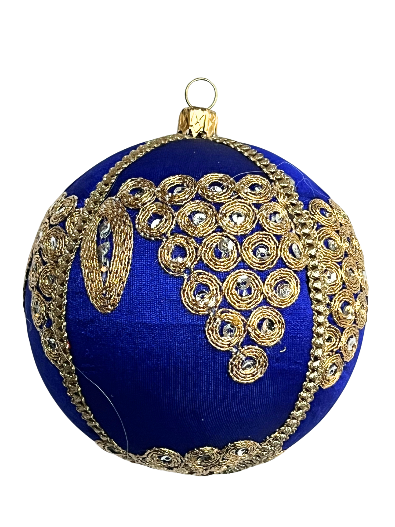 Close-up of the Arjun Bauble – a deep royal blue 10cm fabric ornament featuring intricate gold thread embroidery and spiral beadwork, finished with a metallic gold hanging top.