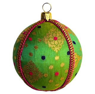 Jaya Bauble – 8cm green brocade ornament with gold diamond motifs, pink, navy and yellow accents, finished with pink-gold braid, handmade in the UK.