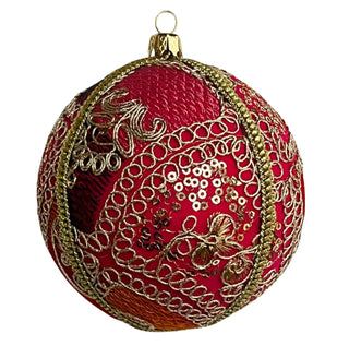 A single 10cm Aarna Bauble with vivid red fabric and intricate gold thread and sequin detailing, displayed on a clean white background.