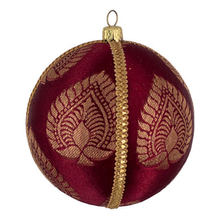 The Anant Bauble in 10cm, featuring rich burgundy velvet with intricate gold lotus-inspired embroidery and a gold trim, shown in close-up against a white background.