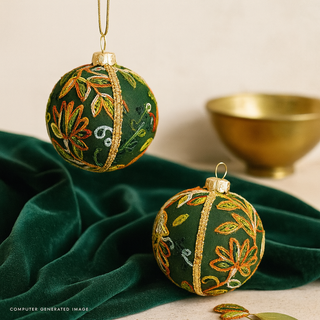 Close-up of Anung Bauble showing leafy embroidery and gold braid trim.