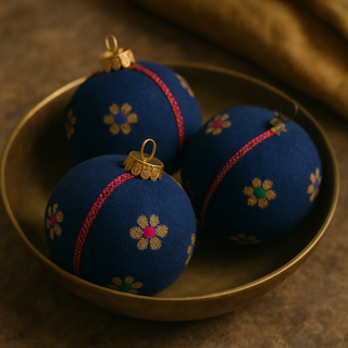 Set of Dancing Florals Baubles in navy brocade with vibrant floral weave and metallic braid, luxury handmade decorations.