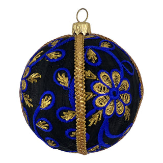 Close-up of the Ishana Bauble in 8cm, featuring black fabric with bold royal blue and gold floral embroidery, finished with gold braid trim.