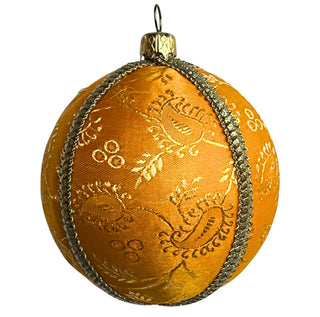 Single bauble cut out. Janvi Bauble – 8cm handmade fabric ornament in golden-yellow brocade with subtle floral motifs and antique gold trim, luxury sustainable décor