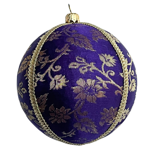 Kaasni Bauble – 8cm royal purple brocade ornament with gold floral motifs and gold braid, handmade in the UK.