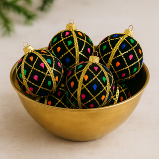 Kamiya Bauble styled for bold home or event décor, colourful sustainable handmade piece.