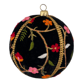 Close-up of the Kashvi Bauble in 10cm, featuring soft black velvet with intricate floral embroidery in pink, orange, red and green, finished with gold braid trim.