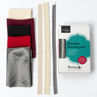 Ruby Nights Mashquin booster pack: ruby red, burgundy, black, grey satin and cream fabrics with lace and crochet trims beside the booster pack box