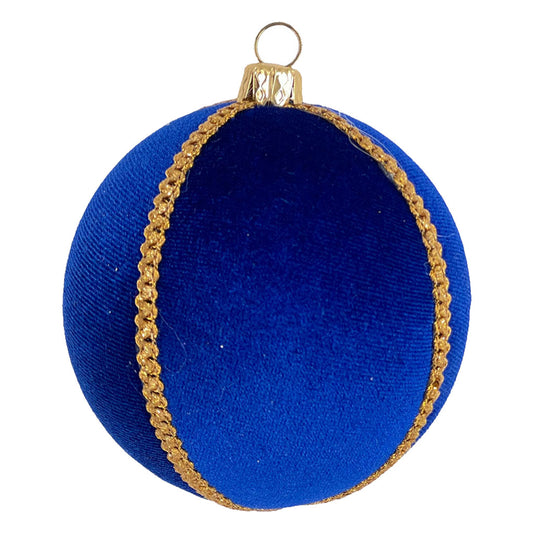 Single Radha Bauble isolated on a white background, showcasing its vivid cobalt blue velvet and detailed gold trim in a clean, high-end product view.
