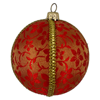 Close-up image of the Raj Bauble featuring rich red floral brocade with gold trim, showcasing its detail and handmade finish.
