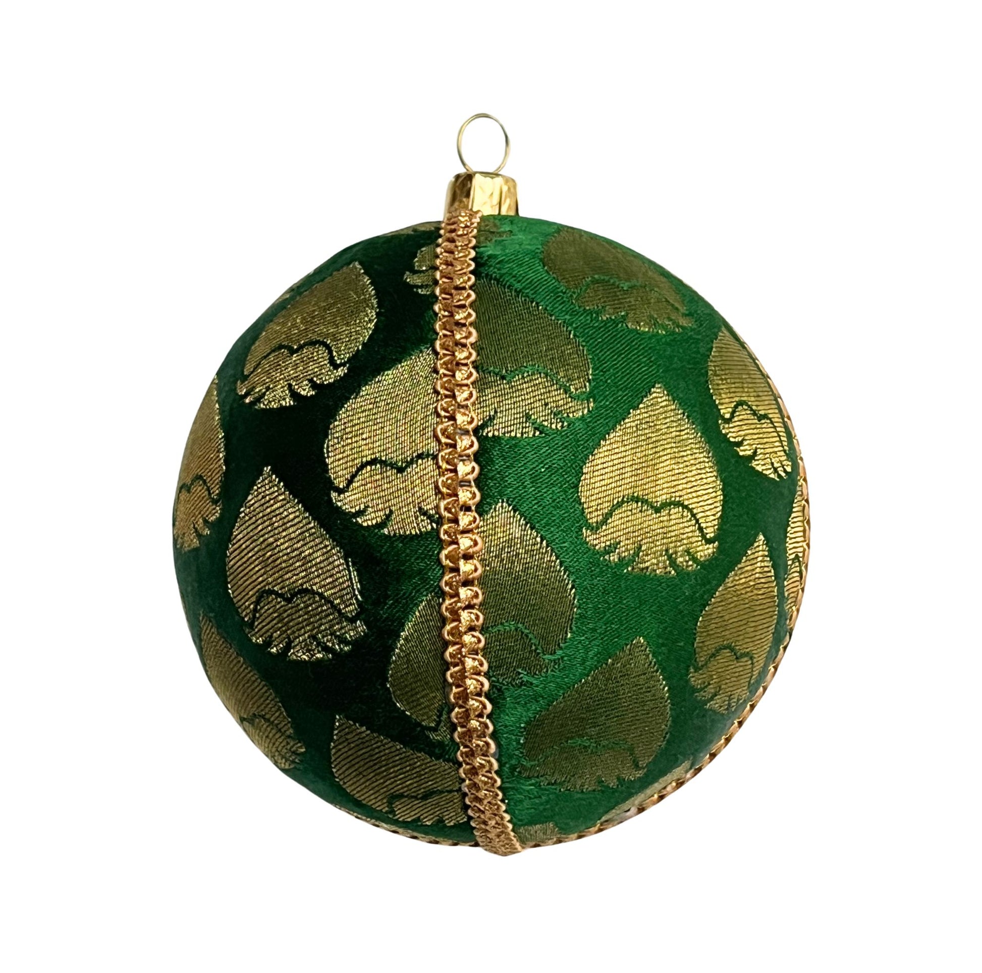 single rayansh bauble one a black background to show beauty. Rayansh Bauble – 10cm handmade fabric ornament in emerald green brocade with gold leaf motifs, luxury sustainable décor