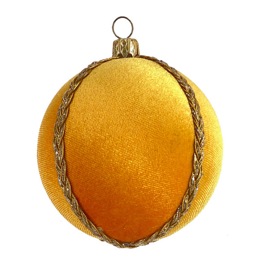 Single Saavi Bauble on a white background, featuring its vibrant yellow velvet and detailed gold trim, captured in a clean, high-end product view.