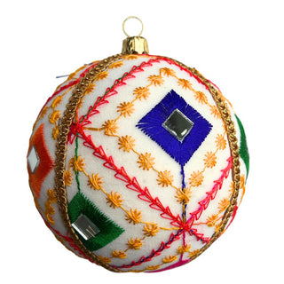 A single Sohan Bauble featuring a cream base with colourful diamond embroidery in red, green, blue, and orange, detailed with mirror accents and gold braid trim.