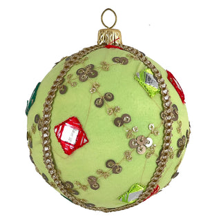 Single light green velvet Christmas bauble with gold trim, colourful mirror embroidery, and sequin detailing, photographed on a clean white background.